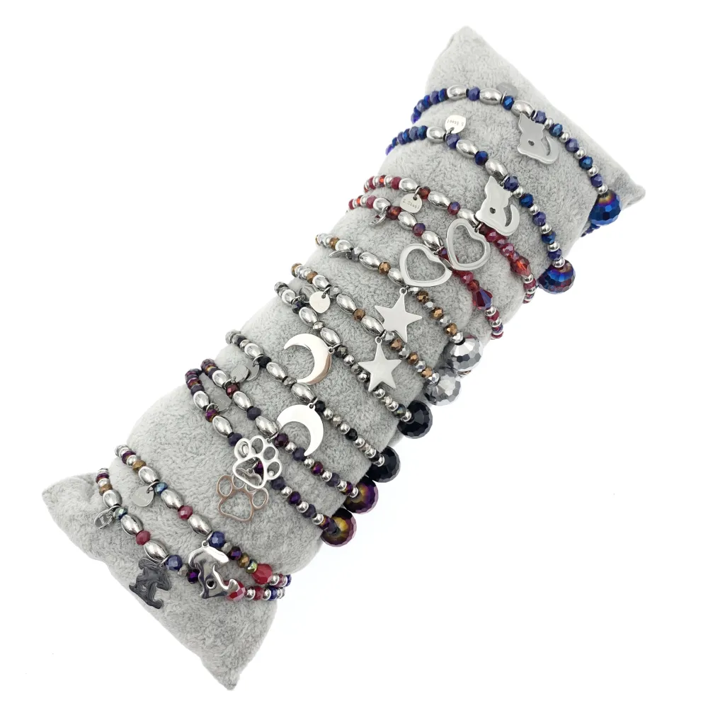 12Pz Bracciali Elastici in Acciaio+Cuscino in Omaggio - BPA7678-Mix Soggetti-12 Pz Bracciali in Acciaio