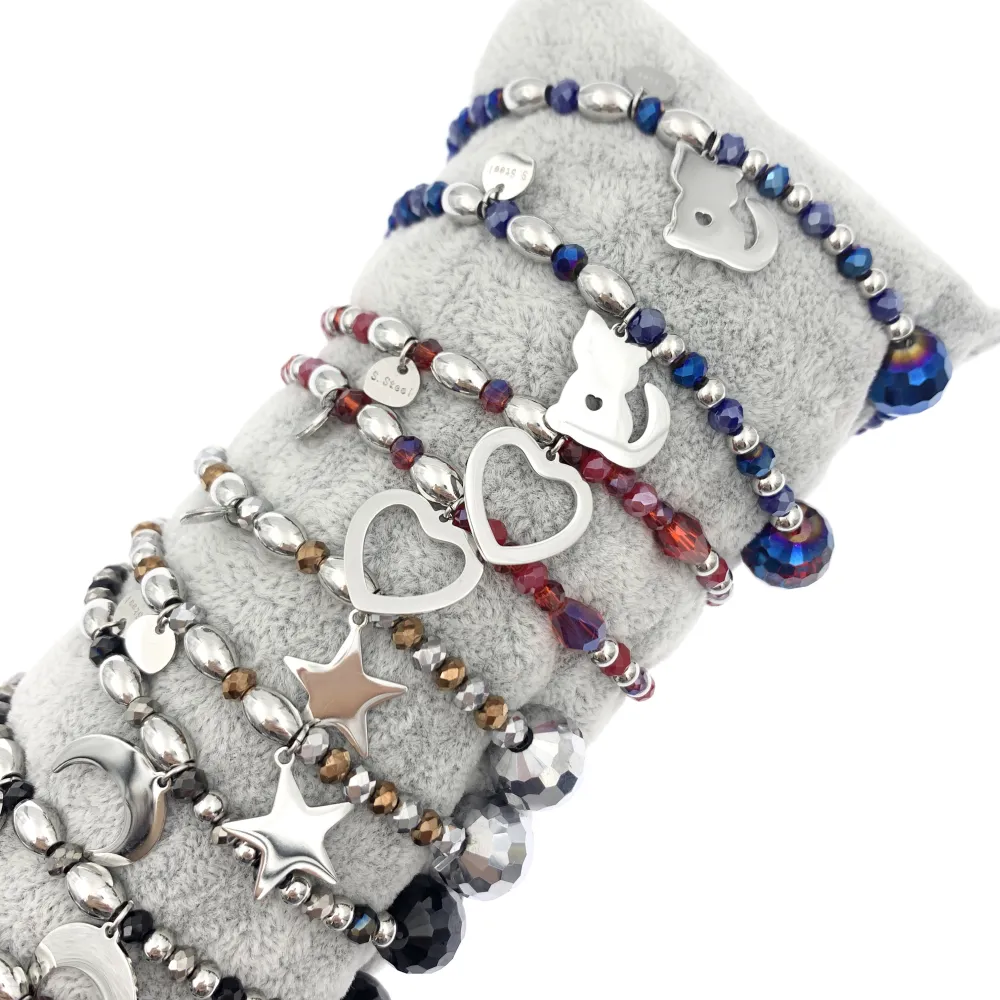 12Pz Bracciali Elastici in Acciaio+Cuscino in Omaggio - BPA7678-Mix Soggetti-12 Pz Bracciali in Acciaio