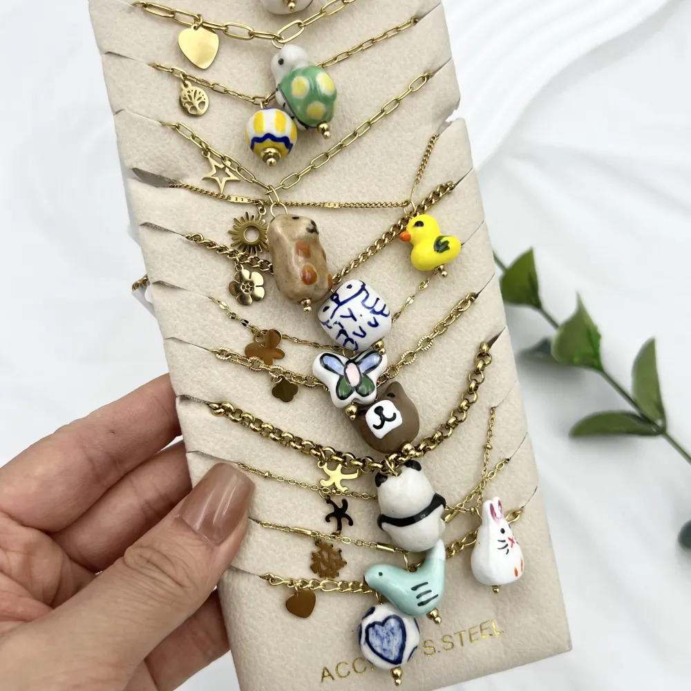 Mix Soggetti Ceramica -12pz Collane Corte in Acciaio - CPA-765-61