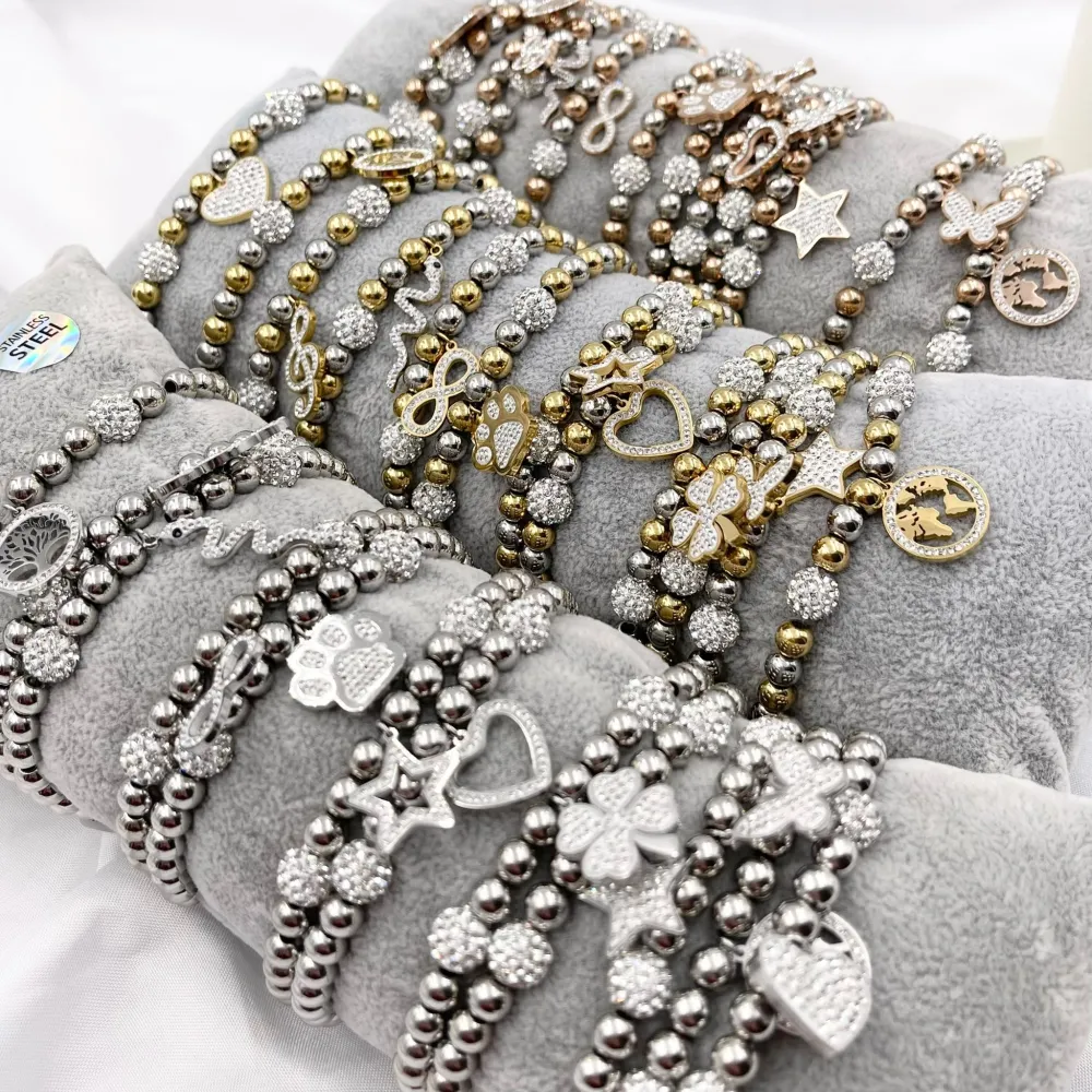 [BPA-413-262] Mix Soggetti- 12 Pz Bracciali Elastici in Acciaio - BPA-413-262 (Acciaio)
