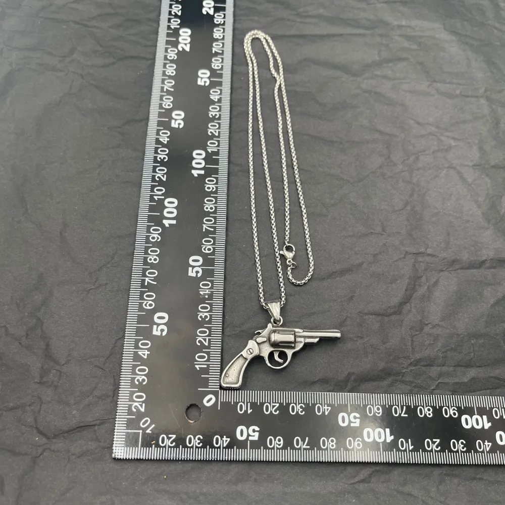 Pistola-Collana Lunga in Acciaio - CAU-423-66 (Oro Giallo)