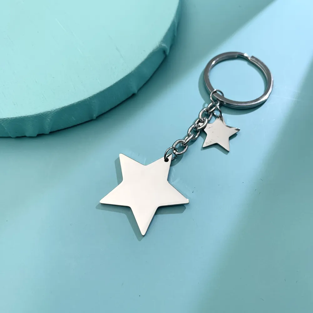 PKA74790-Stella Liscio- Portachiavi in Acciaio - PKA413-574